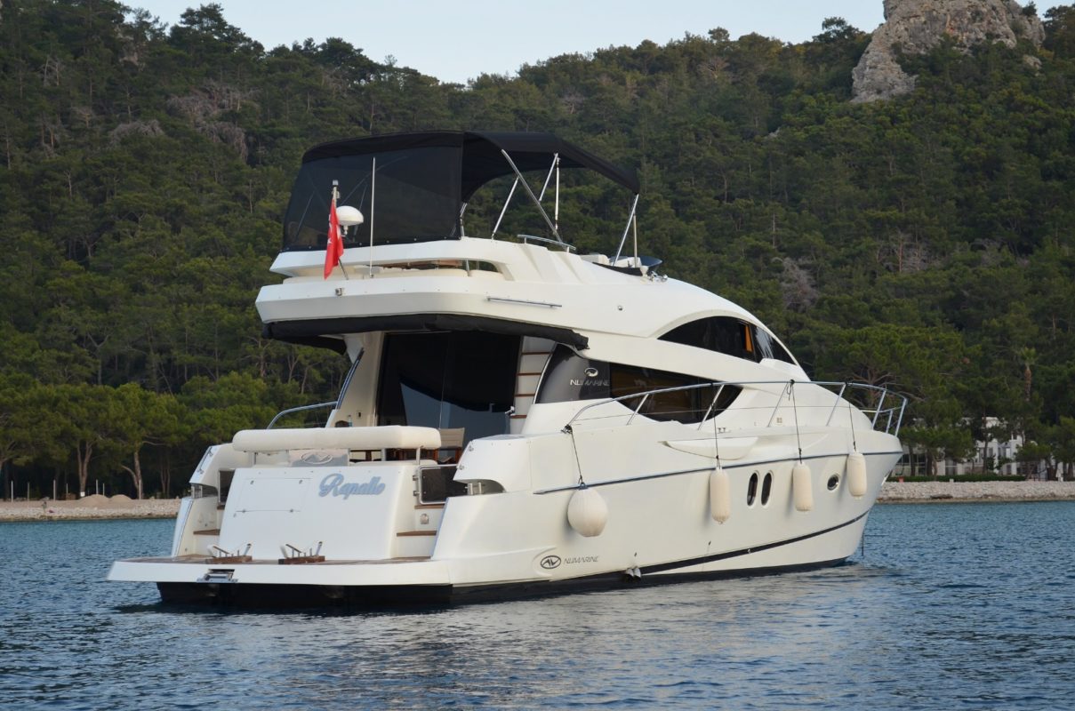 single yacht sailing on a calm sea