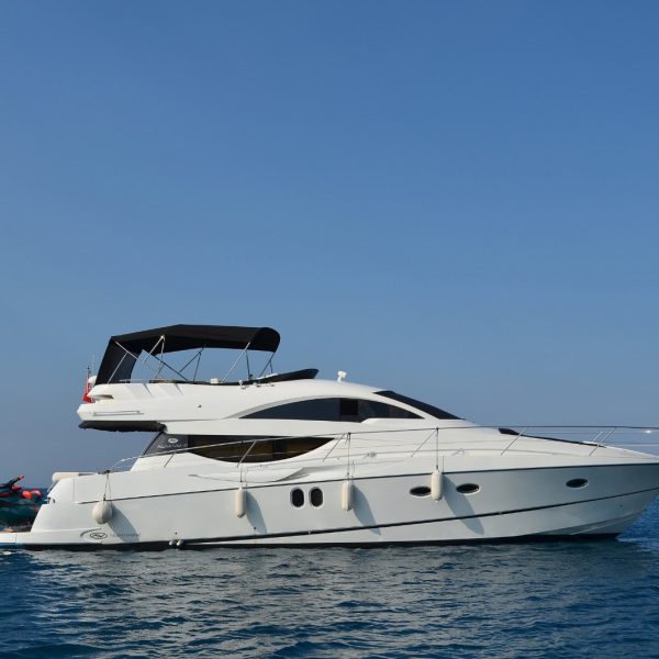 Side view of a yacht sailing in the sea